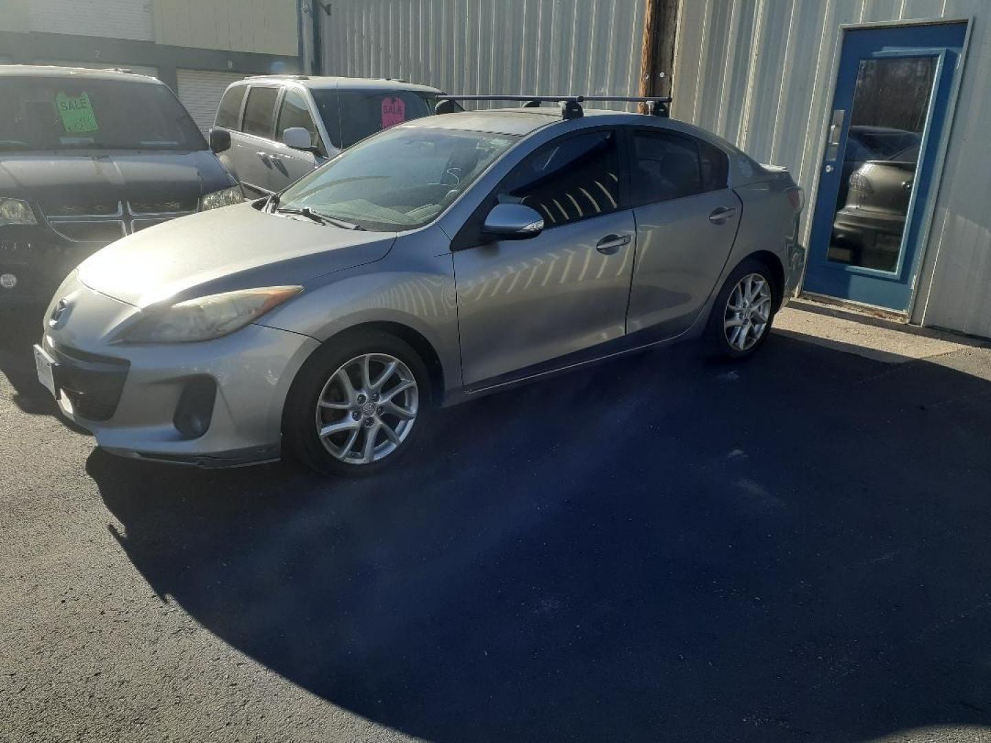 2012 Mazda MAZDA3 s Grand Touring 4-Door (JM1BL1W64C1) with an 2.5L L4 DOHC 16V engine, located at 2015 Cambell Street, Rapid City, SD, 57701, (605) 342-8326, 44.066433, -103.191772 - CARFAX AVAILABLE - Photo#0